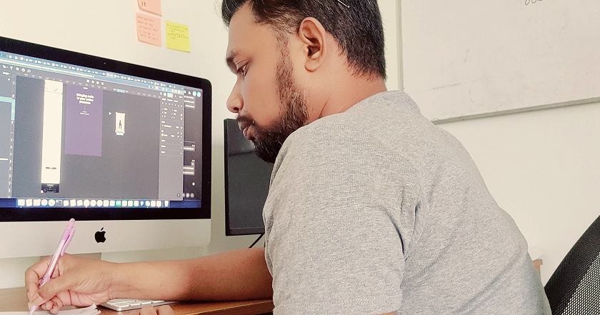 Abdus profile photo working at computer